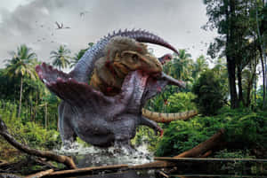 A Dinosaur Is Fighting Another Dinosaur In The Jungle Wallpaper