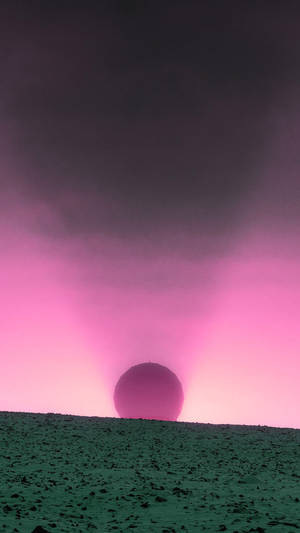 A Dreamy Pink Sunset On An Iphone Wallpaper