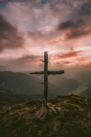 A Faith Filled Cute Cross Against A Bright Cranberry Background Wallpaper