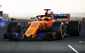 A Glimpse Of The Mclaren Team During The 2021 Formula 1 Season Wallpaper
