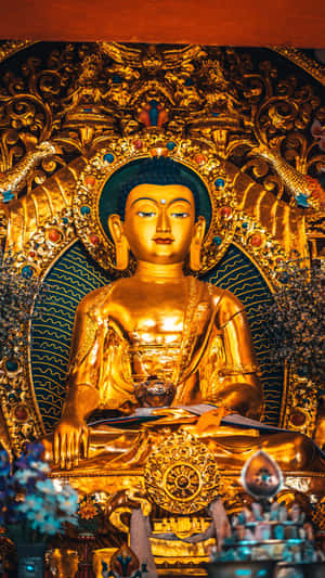 A Golden Buddha Statue Wallpaper