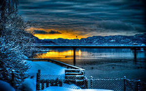 A Gorgeous Sunset Seen Through A Tablet Wallpaper