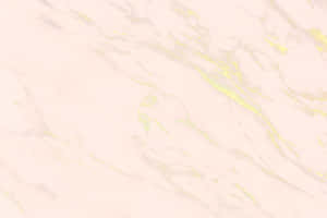 A Gradient Of Light Pink And Gold Hues In A Lavish Wallpaper Pattern Wallpaper