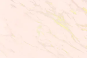A Gradient Of Light Pink And Gold Hues In A Lavish Wallpaper Pattern Wallpaper