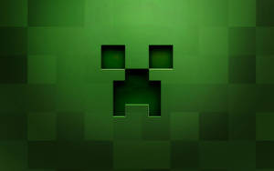 A Green Creeper Face In Minecraft Wallpaper