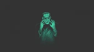 A Green Image Of A Frankenstein Monster Wallpaper