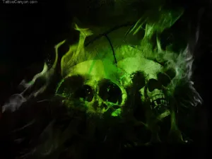 A Green Skull Surrounded By Flames. Wallpaper