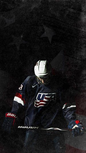 A Hockey Player Holding A Stick Wallpaper