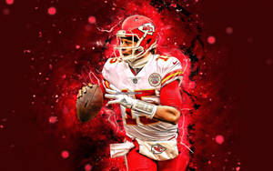 A Kansas Chiefs Player Holding A Football Wallpaper