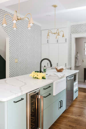 A Kitchen With A White Island And A White Sink Wallpaper