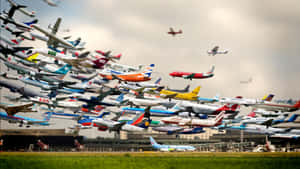 A Lot Of Airplanes Flying In The Sky Wallpaper