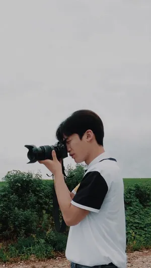 A Loving Couple Enjoying Their Time Together Outdoors Wallpaper