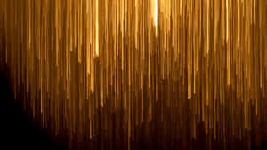 A Luxurious Black And Gold Desktop With A Sleek Design Wallpaper