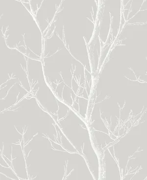 A Majestic White Tree Stands Proud In A Green Meadow Wallpaper