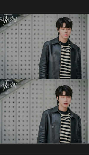 A Man In A Black Jacket And Striped Shirt Wallpaper