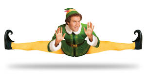 A Man In Elf Costume Doing A Splits Wallpaper