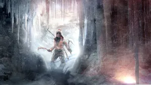 A Man Is Standing In An Icy Cave Wallpaper