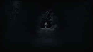 A Man Is Standing In The Dark In A Dark Tunnel Wallpaper