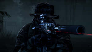 A Man With A Rifle In The Dark Wallpaper