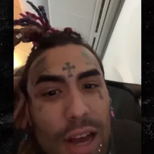 A Man With Tattoos On His Face Wallpaper