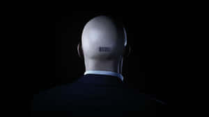 A Mannequin Head With A Barcode On His Head Wallpaper