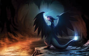 A Mega Charizard X In A Cave, Ready For Battle Wallpaper
