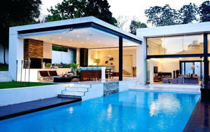 A Modern Home With Pool Wallpaper