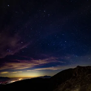 A Mountain With A View Of The City Wallpaper