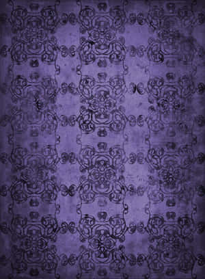A Mysterious View Of A Gothic City Bathed In Purple Light Wallpaper