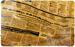 A Newspaper With Old Tamil Words On It Wallpaper