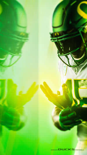 A Passionate Oregon Ducks Football Player In Action On The Field. Wallpaper
