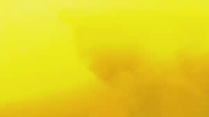 A Pastel Yellow Laptop Sits On A Desk, Ready For Its Next Project Wallpaper
