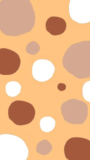 A Pattern Of Circles In Orange And Brown Wallpaper