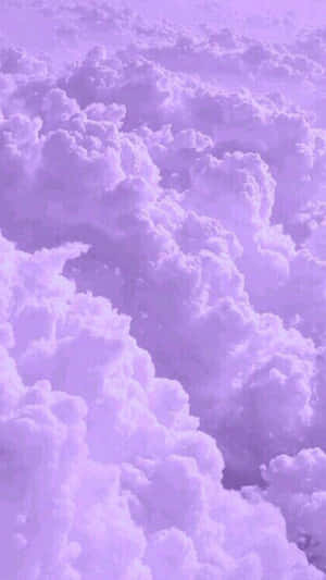 A Peaceful Sky With Colorfull Clouds And Breathtaking Sunsets Wallpaper
