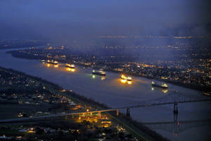 A Peaceful View Of The Mississippi River In The Evenings Wallpaper