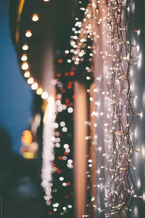 A Perfect Harmony Of Beauty And Spirit - Christmas Lights Adorn The Night. Wallpaper