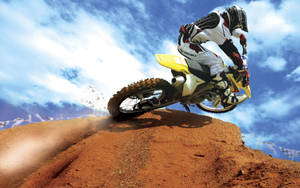 A Person Riding A Dirt Bike Wallpaper