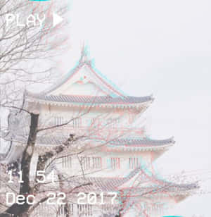 A Photo Of A Japanese Building With Trees Wallpaper