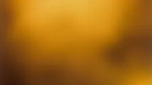A Photograph Of A Yellow Background With A Black Background Wallpaper