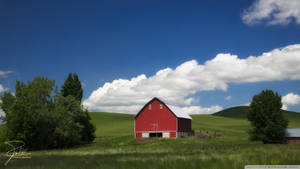 A Picturesque View Of A Tranquil Farmland Wallpaper