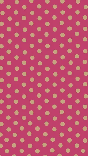 A Pink And Gold Polka Dot Pattern Wallpaper