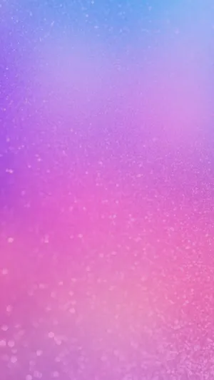 A Pink And Purple Blurred Background With Hearts Wallpaper