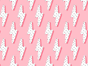 A Pink And White Lightning Bolt Pattern Wallpaper