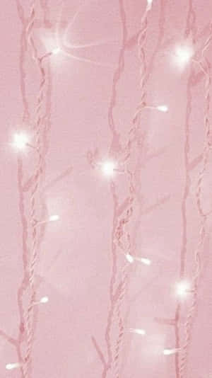 A Pink Background With White Lights On It Wallpaper