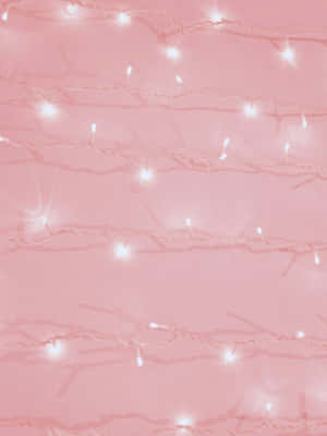A Pink Background With White Lights On It Wallpaper