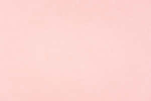 A Pink Paper Background With A White Background Wallpaper