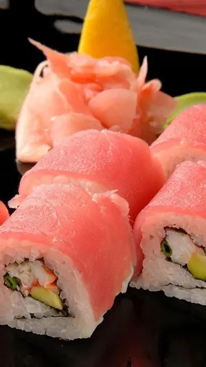 A Plate Of Sushi With A Variety Of Ingredients Wallpaper