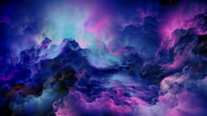 A Purple And Blue Cloudy Sky Wallpaper