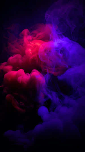 A Purple And Blue Smoke In The Dark Wallpaper