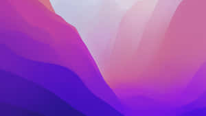 A Purple And Pink Mountain With A Waterfall Wallpaper